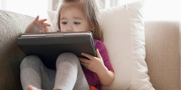 child having screen time